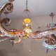 Illustration for article titled Tentacular stained glass octopus chandelier would light up any room